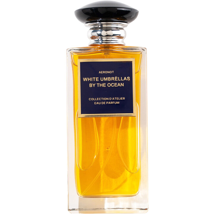 White Umbrellas by the Ocean